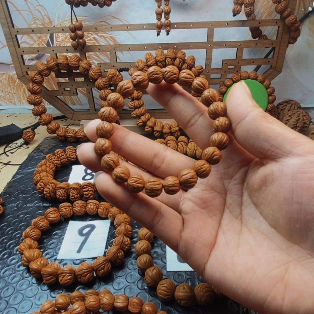 阿***家文玩核桃吊坠龙纹桃核