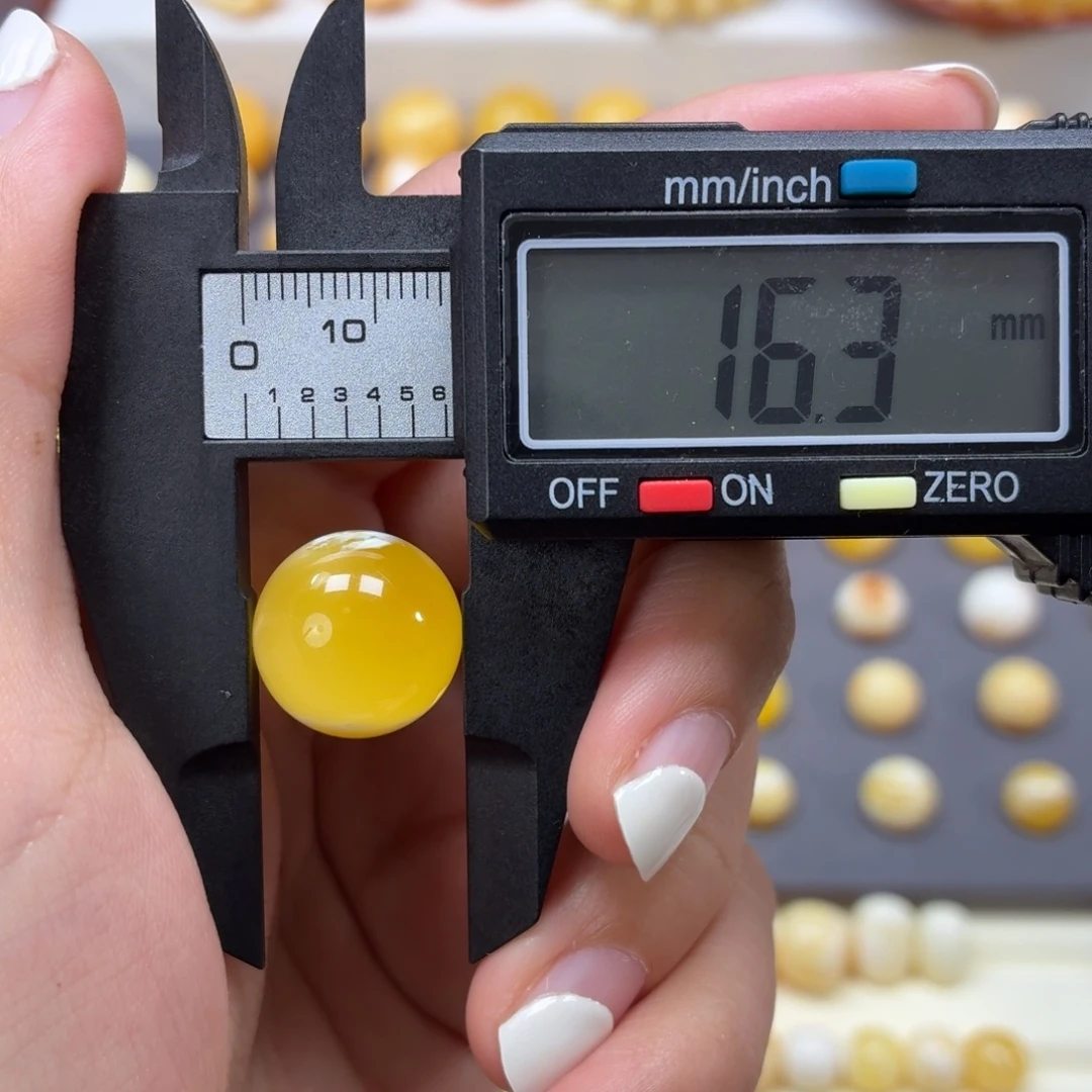 琥珀未镶嵌裸石焦皮橘金溶洞16.3mm
