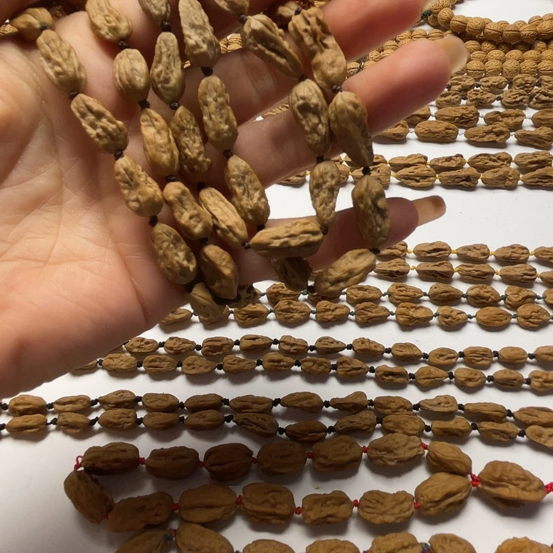 怀***杰吊坠文玩核桃异形