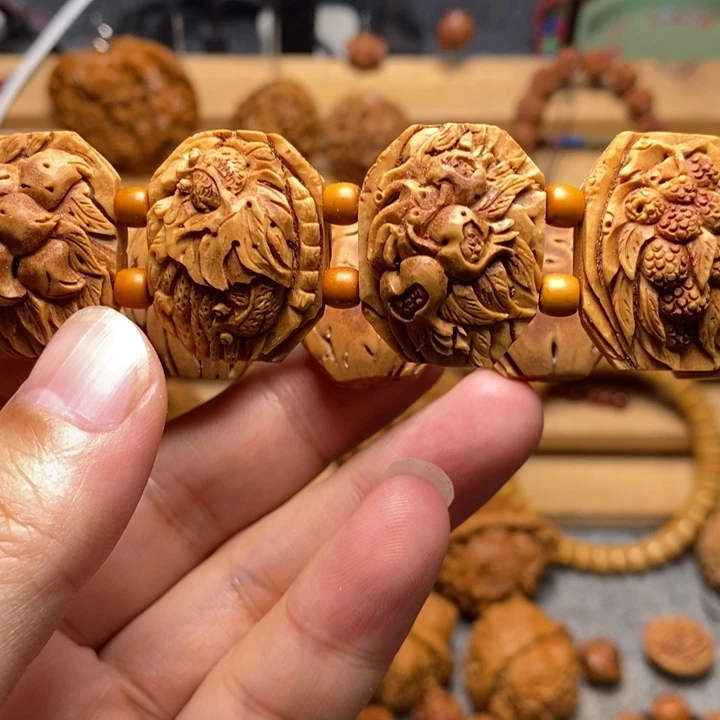 桃核手工雕刻吉祥八宝手牌