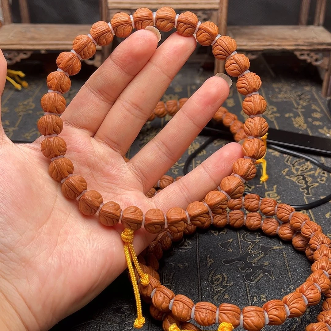 桃核吊坠玉龙手持