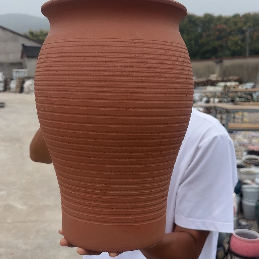 红陶鱼尾一个口径20高度31