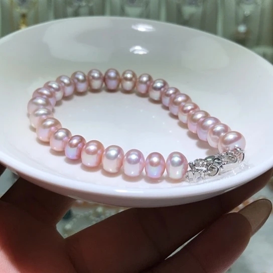 淡水珍珠银S925镶嵌耳饰