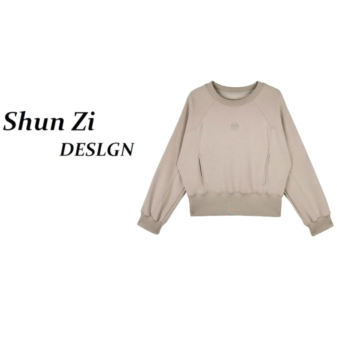 SZ18601-1【粉丝专享】山茶花2025春季简约百搭压花显瘦感套头卫衣