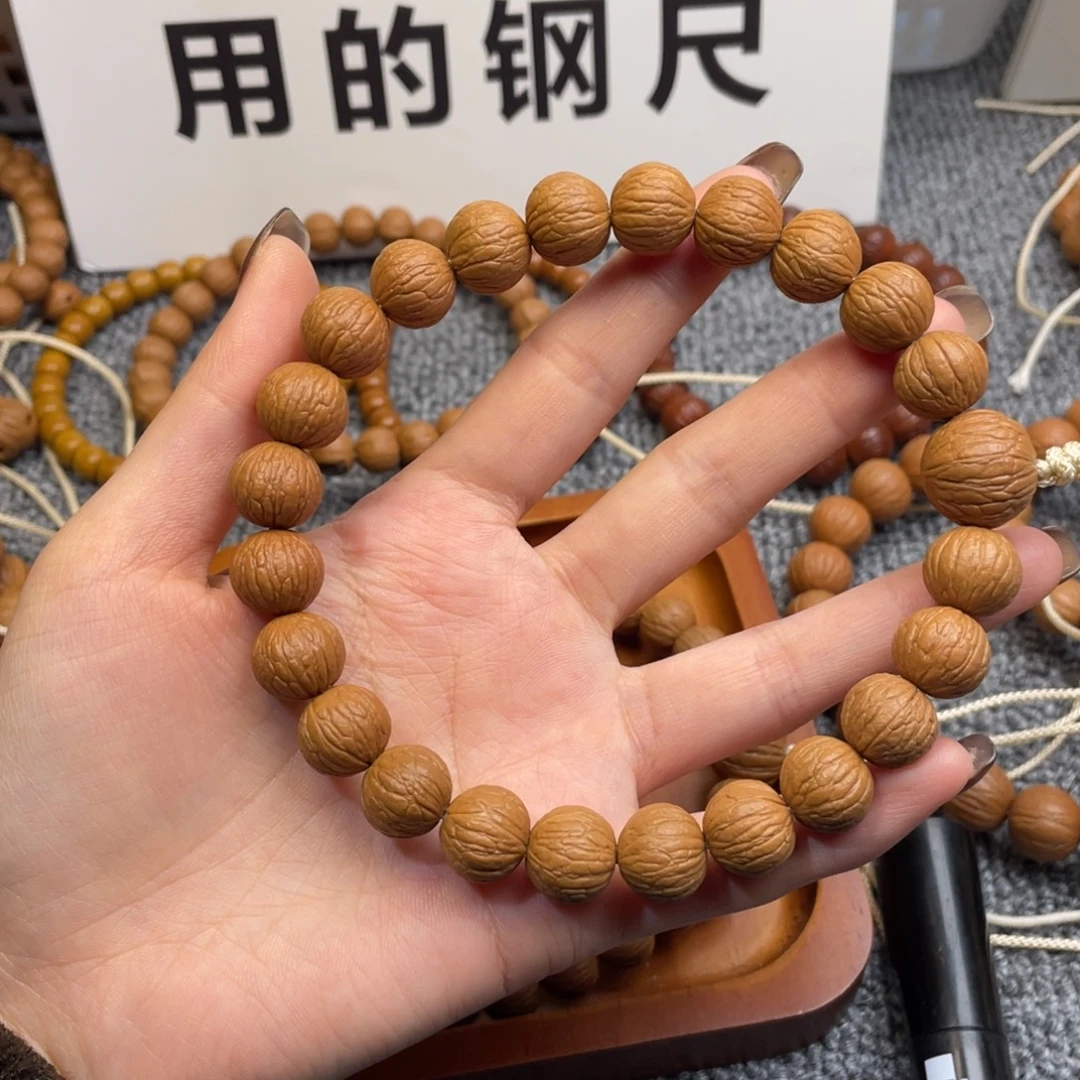 k***.吊坠猴头核桃凤羽