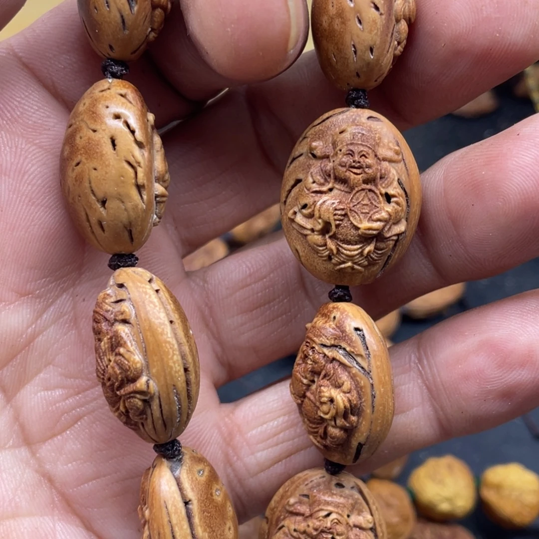 时***，桃核雕刻财神手串