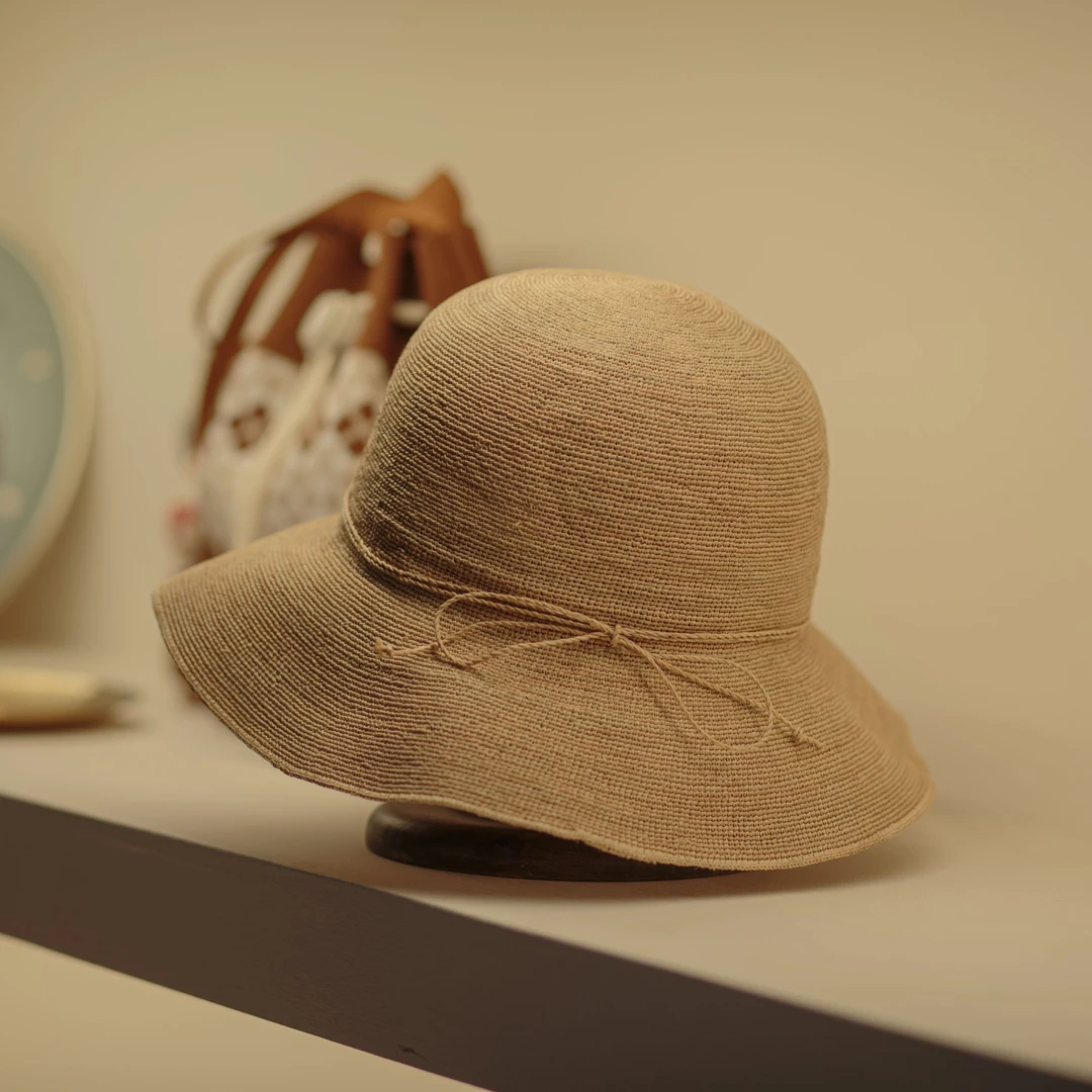 拉菲草帽宽檐蝴蝶结帽子简约春夏平檐便携式遮阳帽大檐