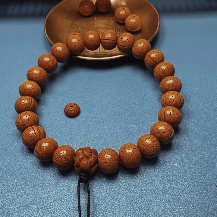 爱***音桃核手持苹果16花皮色差21颗