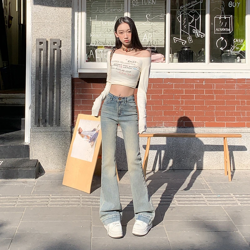 2025年春季新款修身牛仔裤女士微喇显瘦弹力低腰裤水洗怀旧蓝长裤