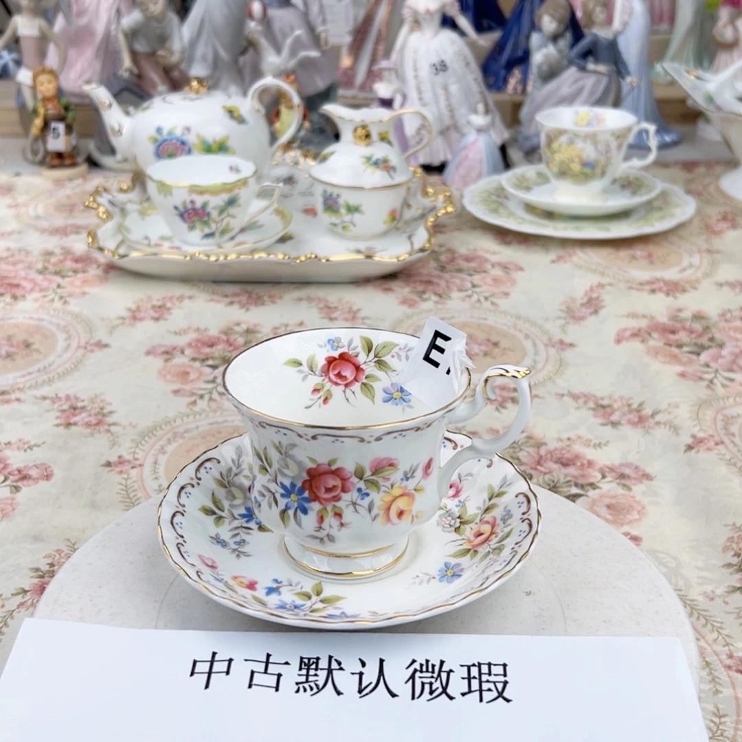 瓷片中古默认微瑕。     有瑕疵