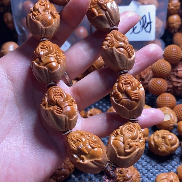 橄榄核吊坠包衣财神