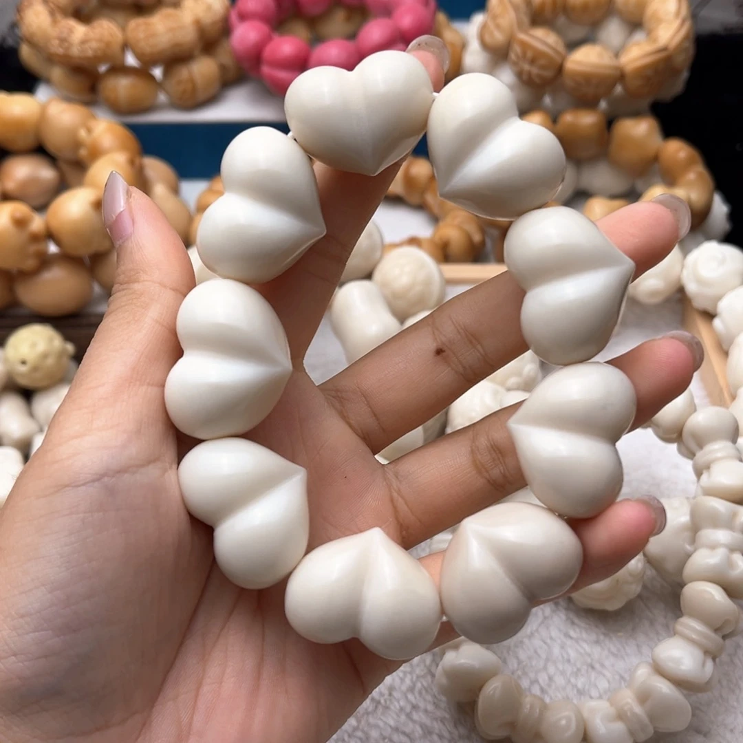 吊坠菩提根/象牙果光面屁桃卡2829