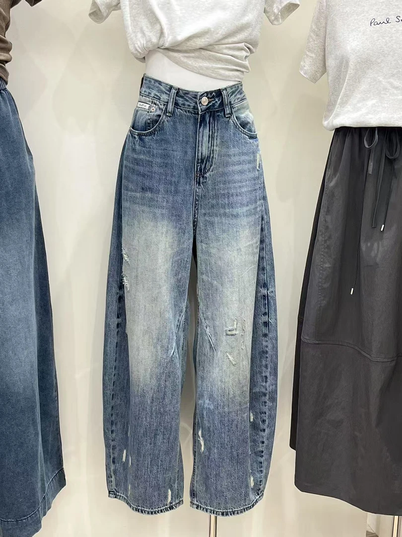 1771破洞水洗弯刀牛仔裤