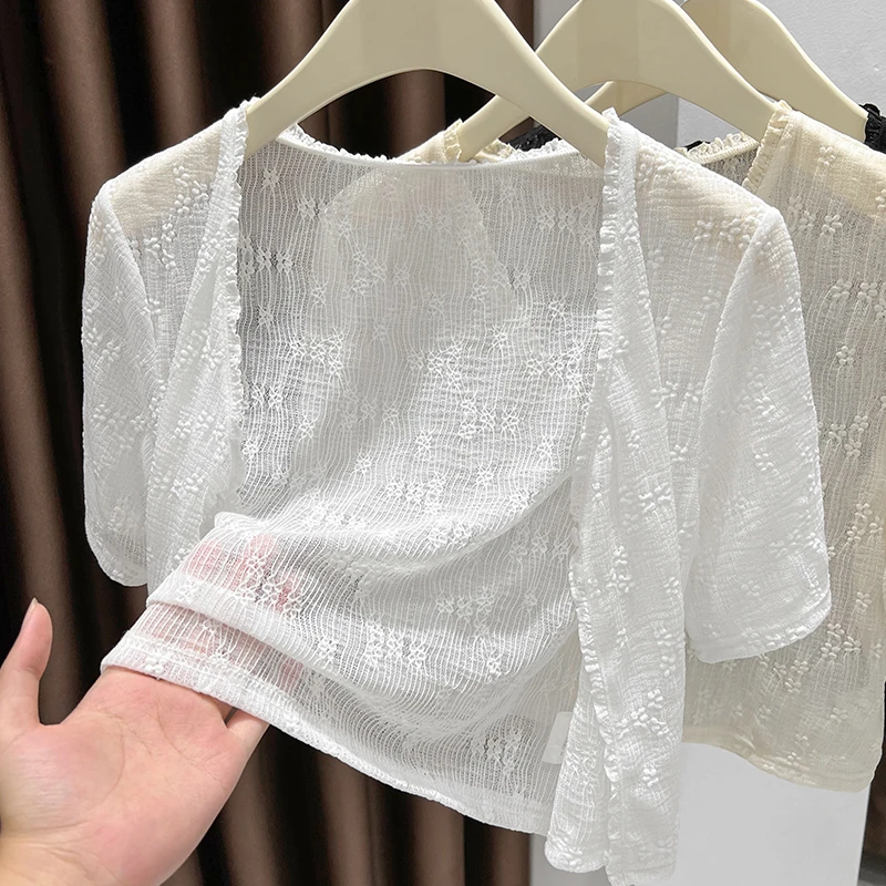 白色V领镂空花纹网纱开衫女2025秋季透视蕾丝防晒短外套薄款披肩