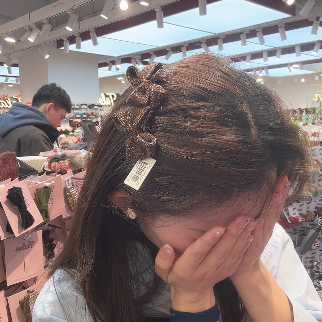 布艺铁合金咖色插梳