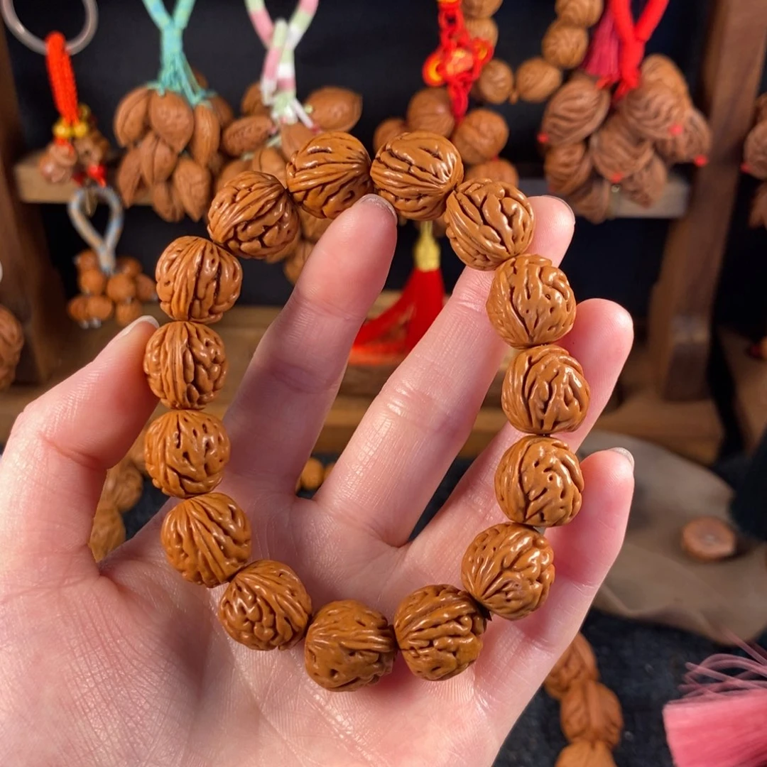 吊坠桃核桃枭手串