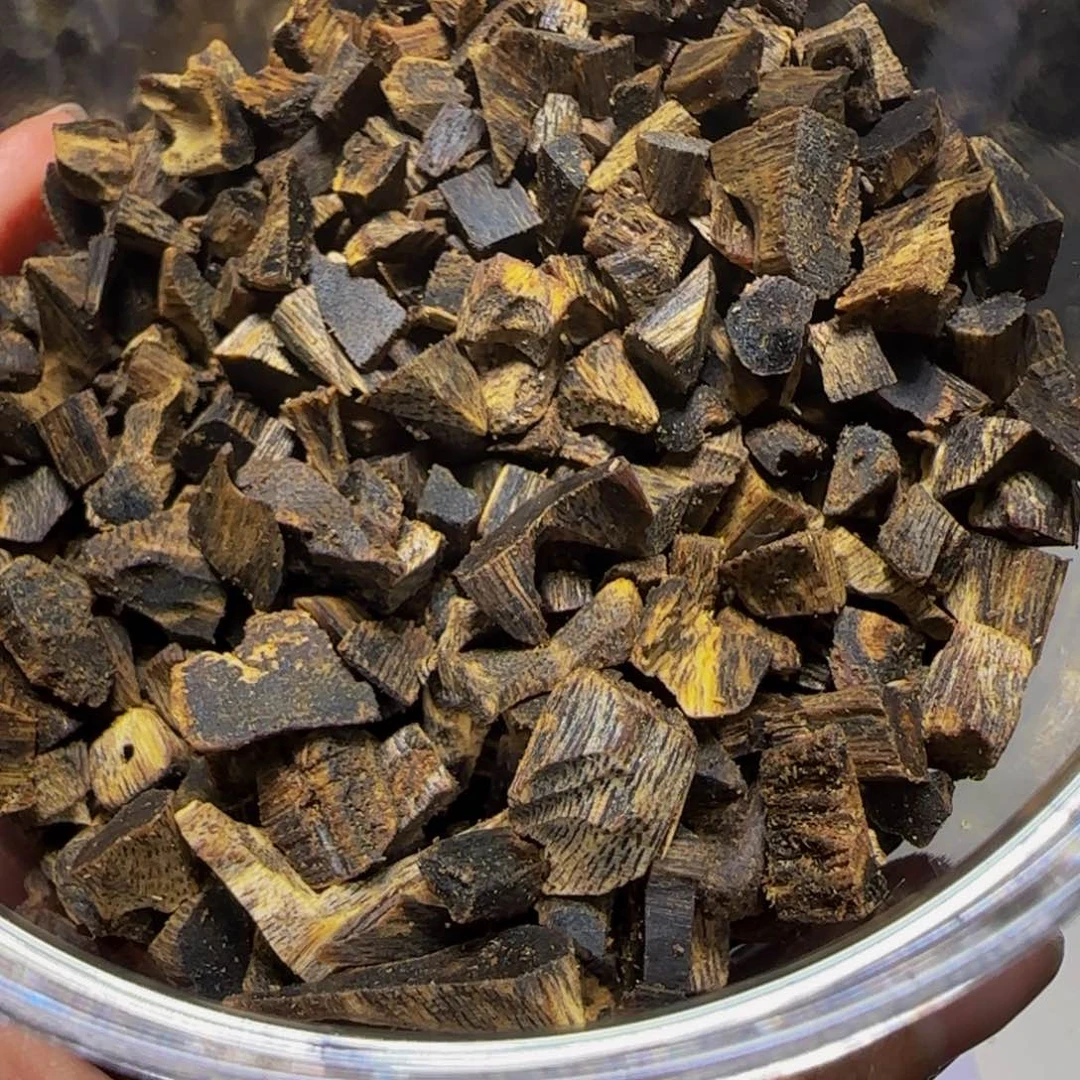 沉香木手把件广****司沉香奇楠海南紫棋老料100克