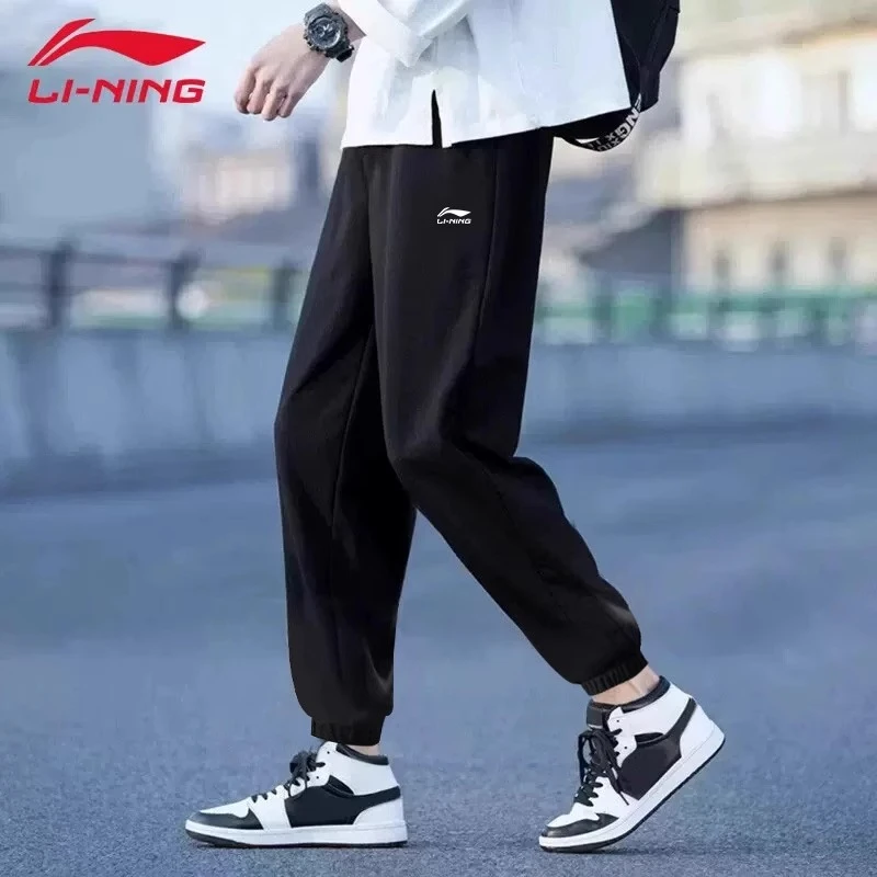李宁运动卫裤男春季黑色青少年时尚潮流棉质针织长款黑色束脚裤