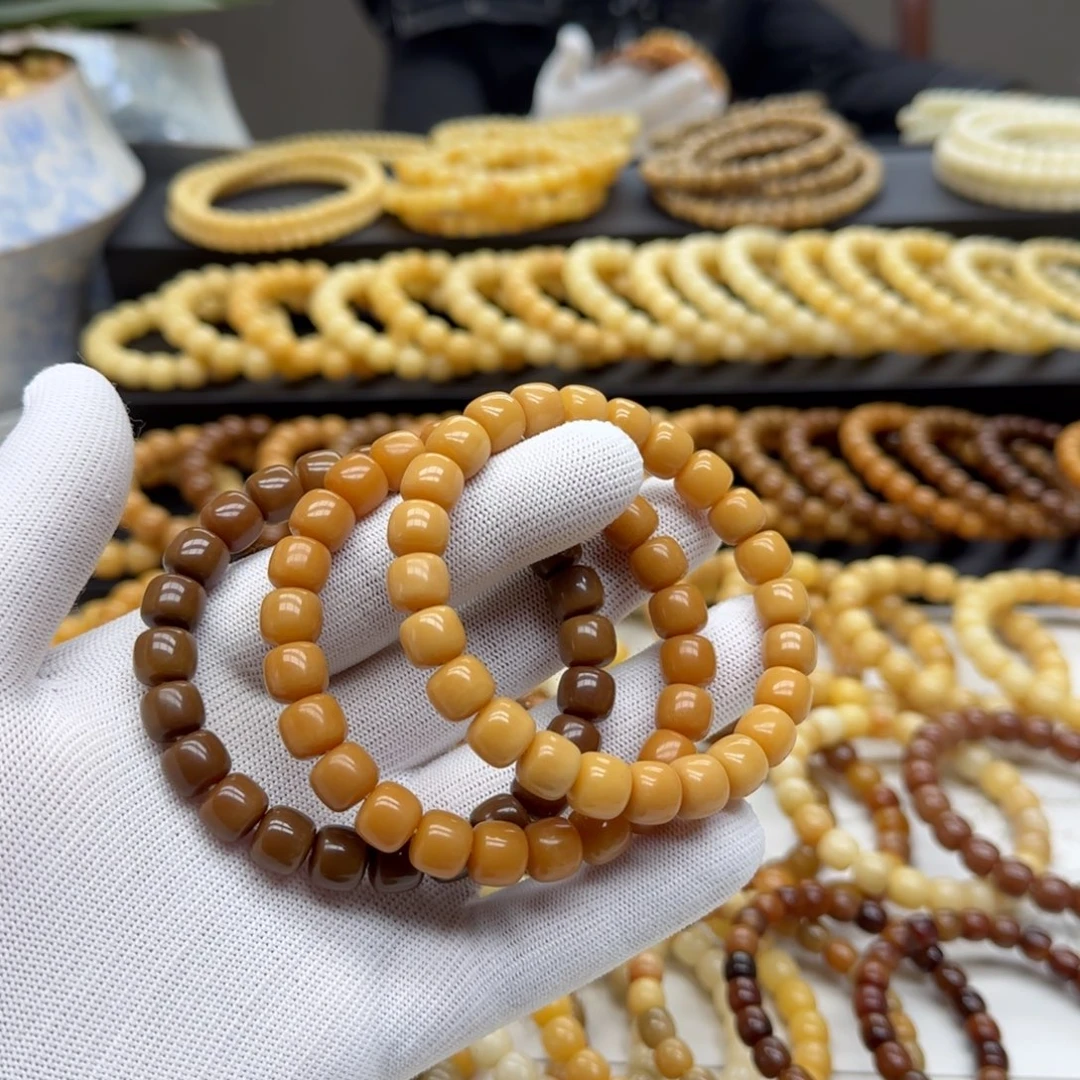 手串菩提根/象牙果9*10精工11年