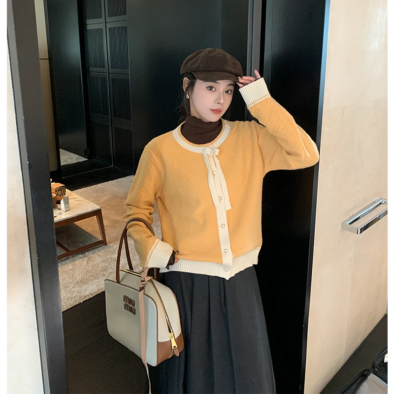 QC李潇洒微胖大码韩系甜美蝴蝶结撞色拼接冬慵懒感抗起球毛衣