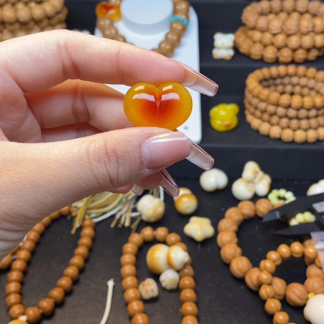 茶***风猴头核桃吊坠补爱心配饰价