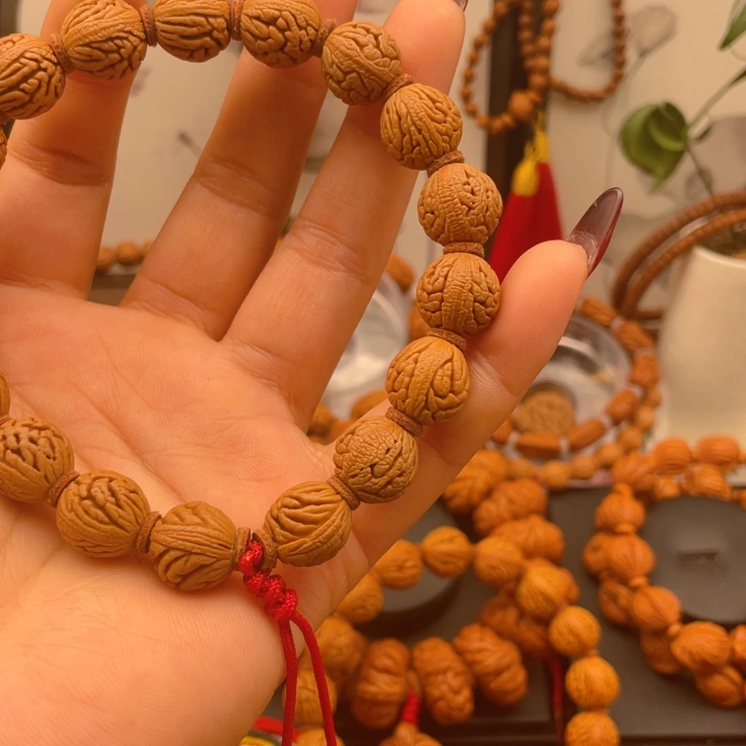 领***f桃核手串红红火火。红红火火