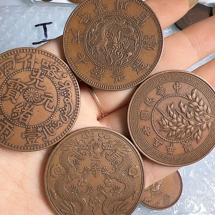 星***烂四个铜币工艺品摆件