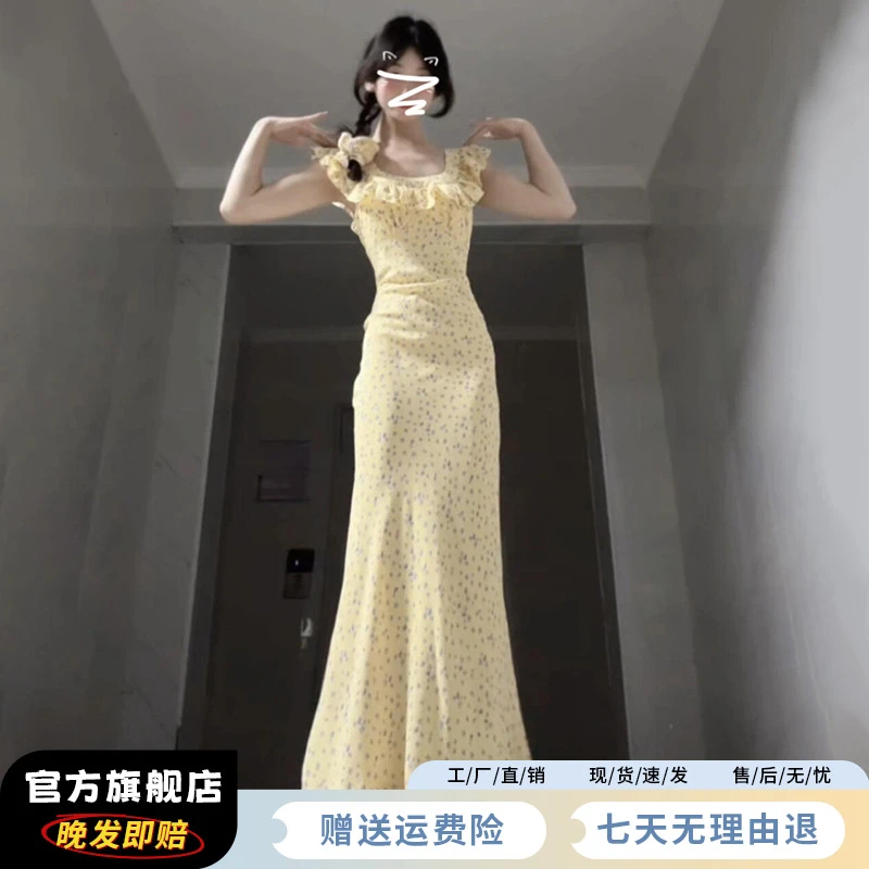 1999茶歇法式碎花连衣裙子女夏季2025新款黄色小飞袖收腰吊带长裙