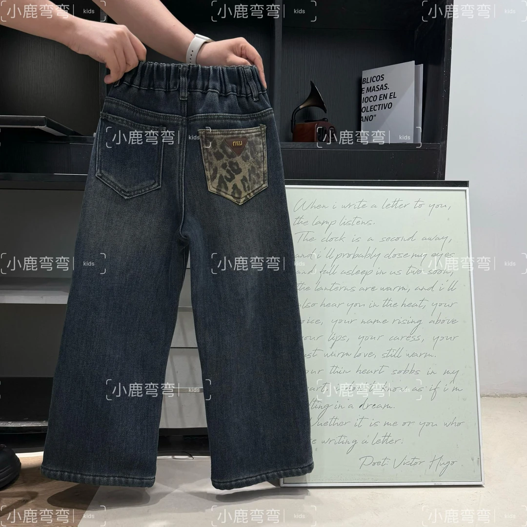 D90秋冬女童新款脚口蝴蝶结毛毛卷边一体绒牛仔裤