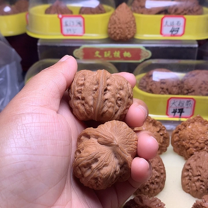 文玩核桃吊坠张*辉平谷元宝