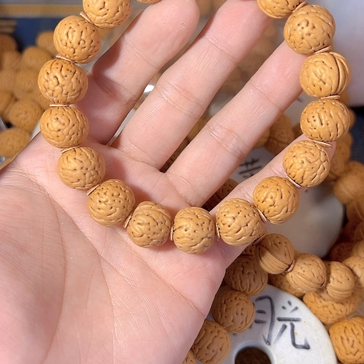 崬***人手串桃核金丹桃核手串