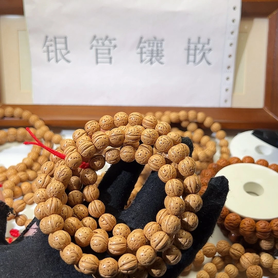 阿***信桃核手串野生光头强