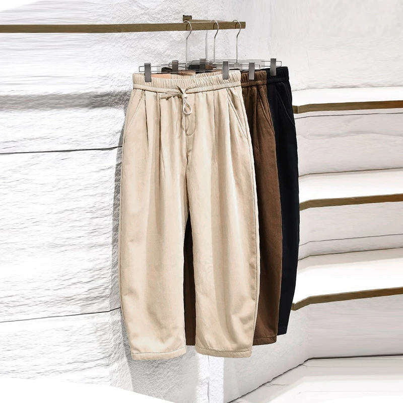 春季男士简约百搭纯色全棉休闲裤男款韩版松紧腰直筒长裤K69-1