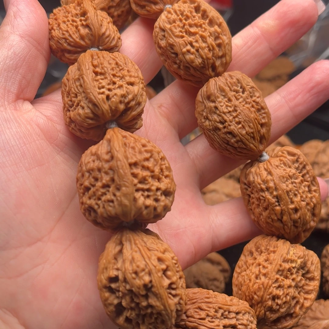 橘***皮核桃把件南疆石手持