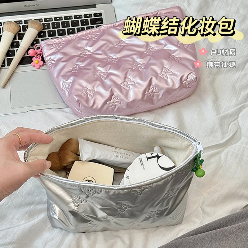 蝴蝶结化妆包新款简约时尚出行收纳包大容量便携旅行洗漱手拿包