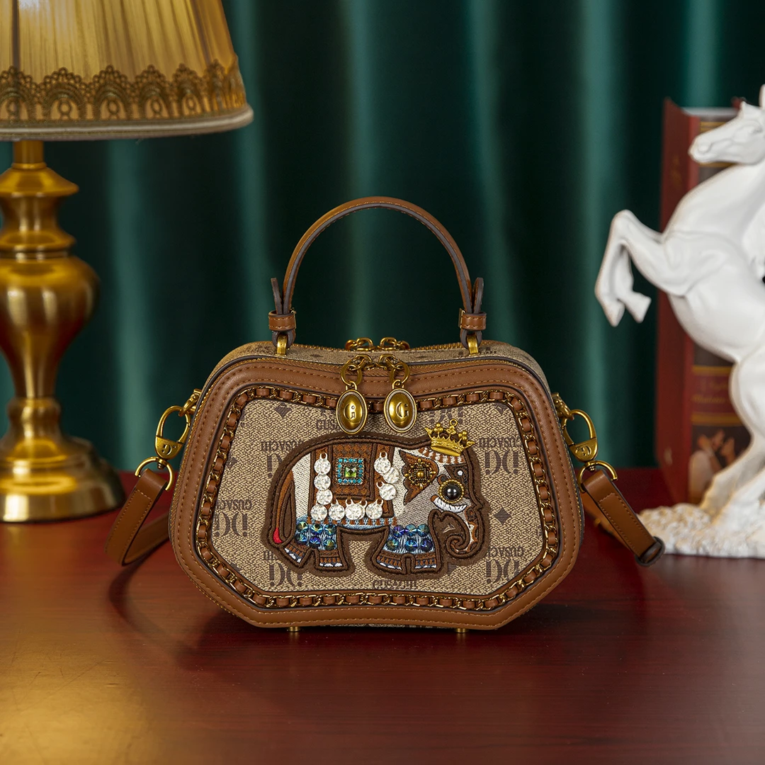 GUSACHI/古萨驰[吉象如意系列]设计款手提包H50393