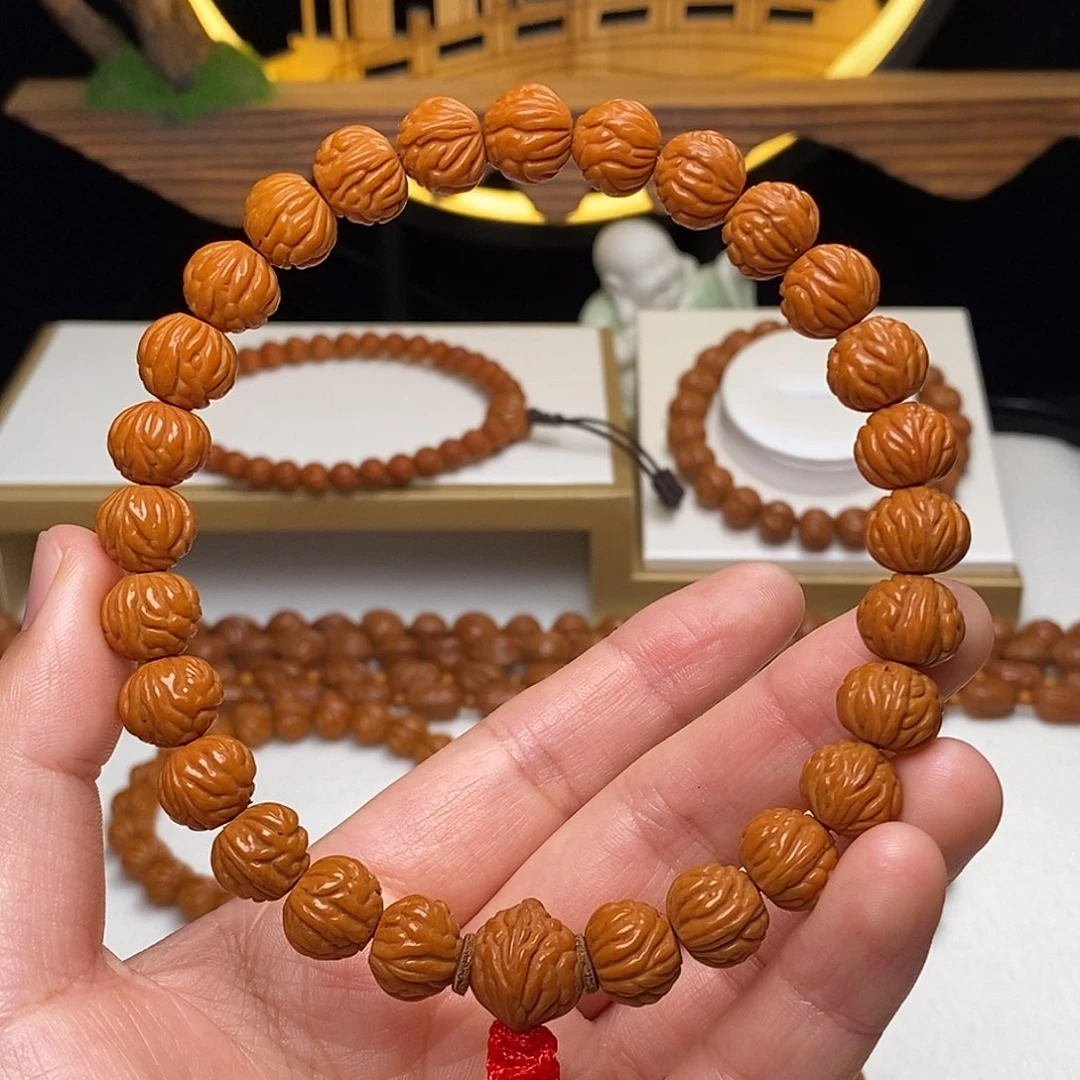 桃核手串11mm野生凤羽聚宝盆桃核手持27颗