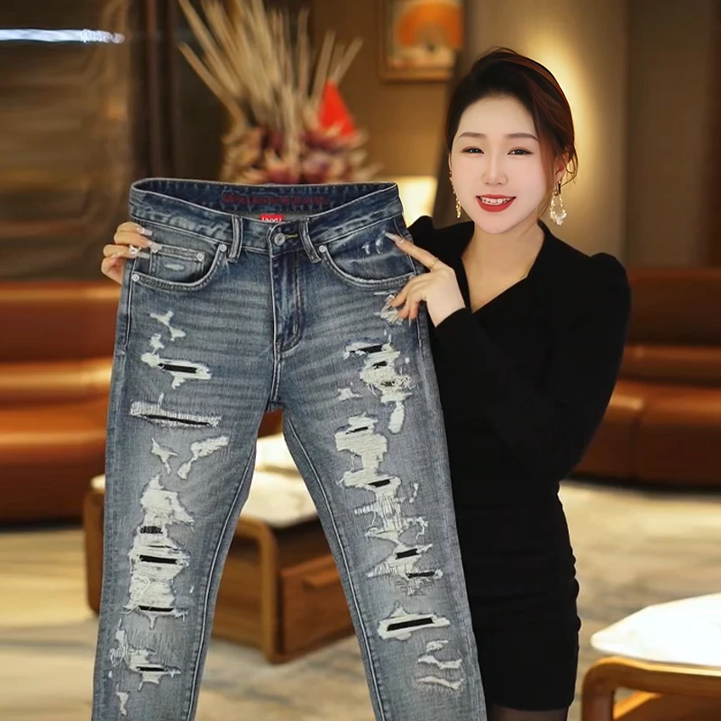 秋冬新款乞丐破洞牛仔裤男美式痞帅修身小脚裤子做旧水洗休闲长裤