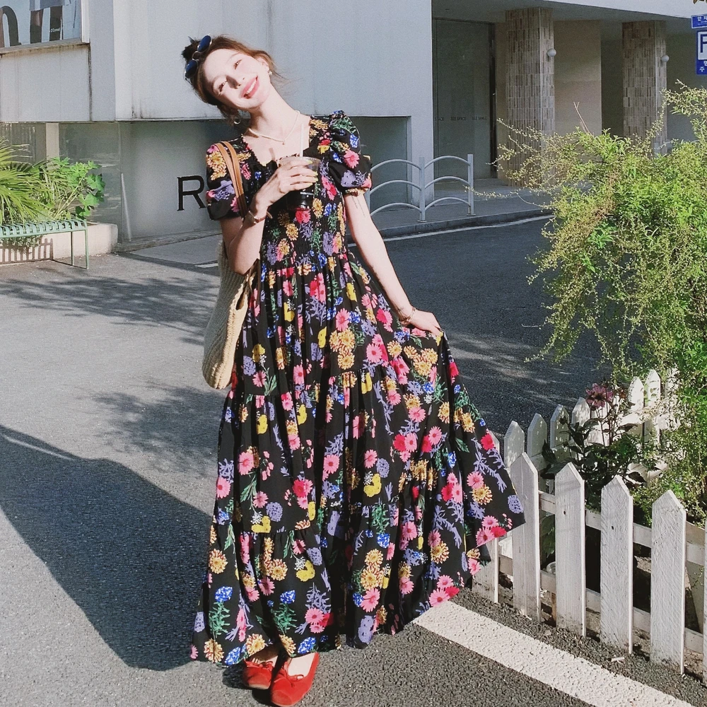 波西米亚风碎花大裙摆连衣裙女2025夏新款高级感后背绑带显瘦长裙