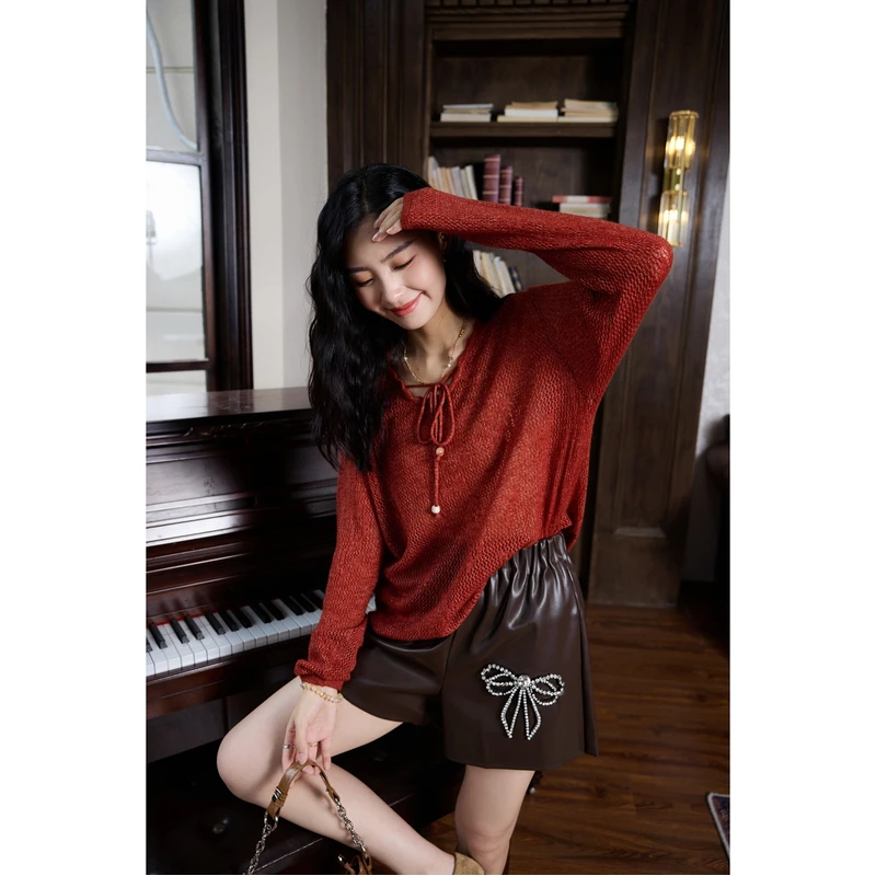 2025早秋新款高端欧货设计感领口系带镂空软糯套头长袖针织衫