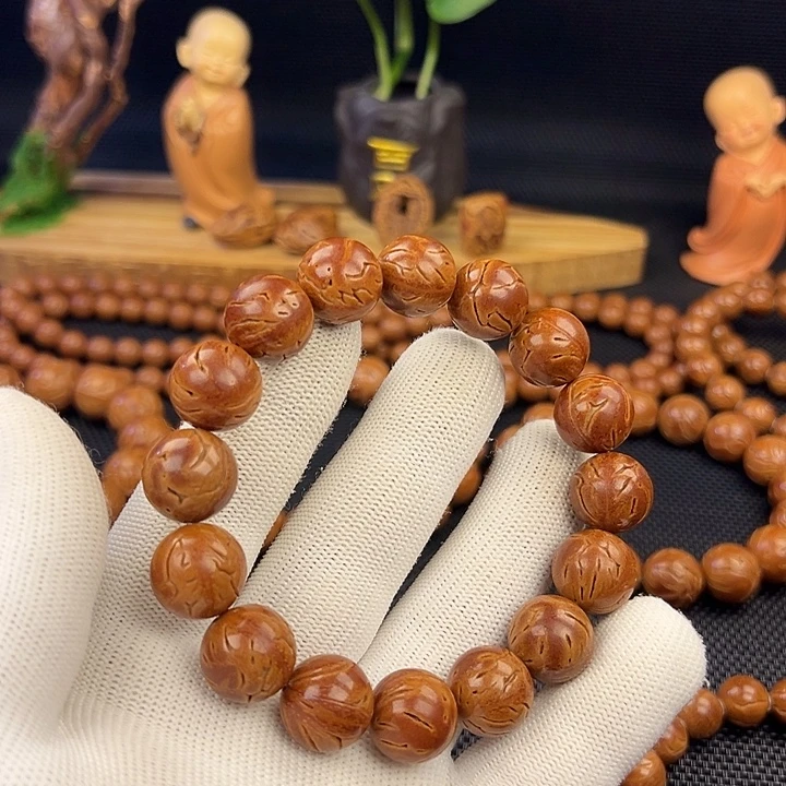 大***昭野生龙纹桃核光珠