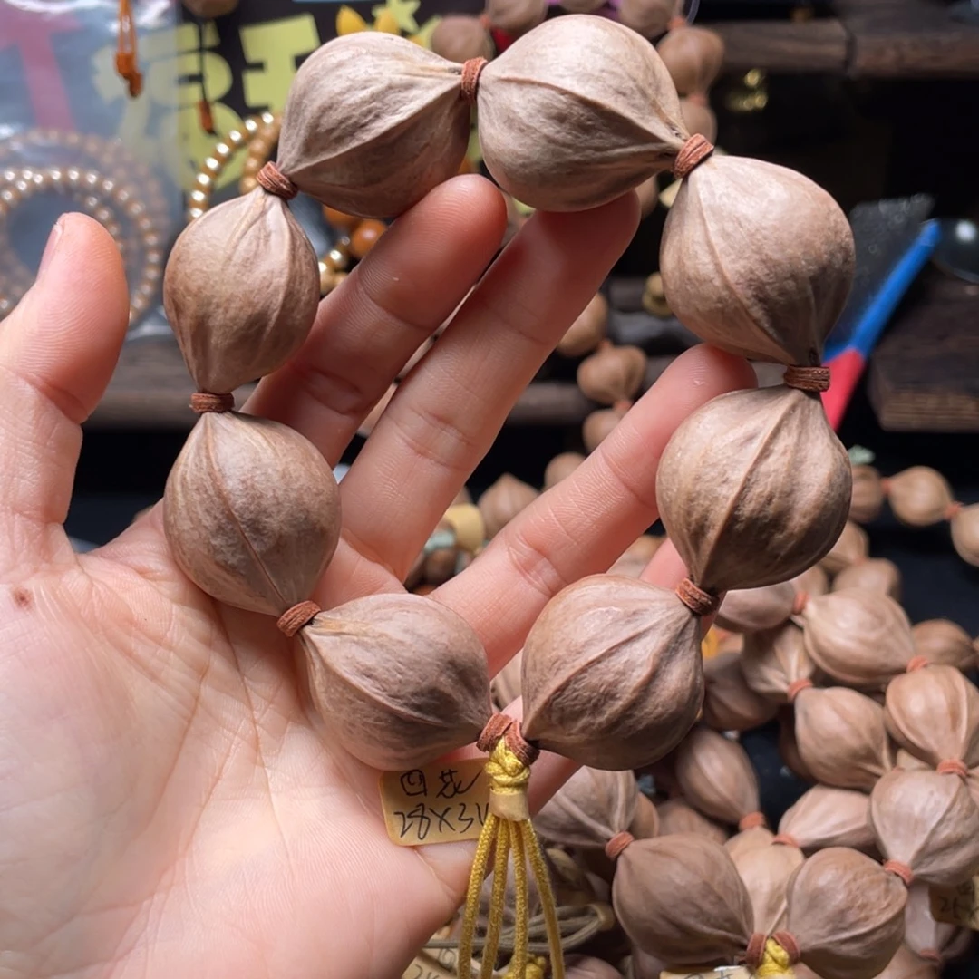 （***）橄榄核吊坠四花2834铁核