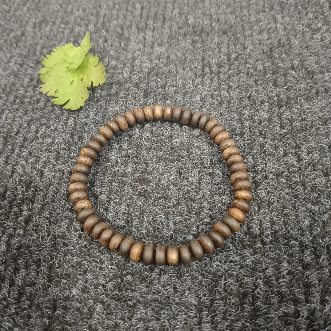 YZ008越南芽庄紫奇楠算盘珠0.7双圈沉水