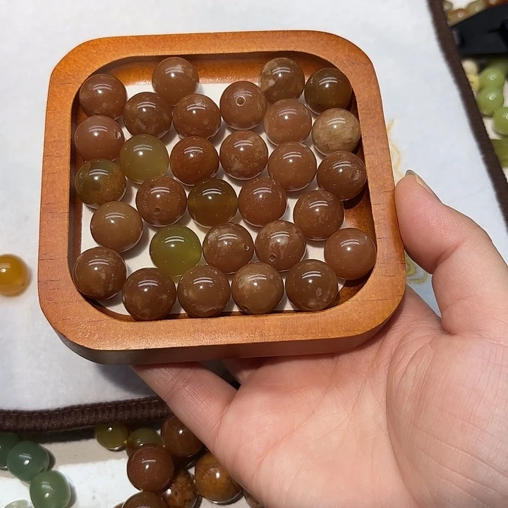 幸***宝蛇纹石玉未镶嵌单珠30个