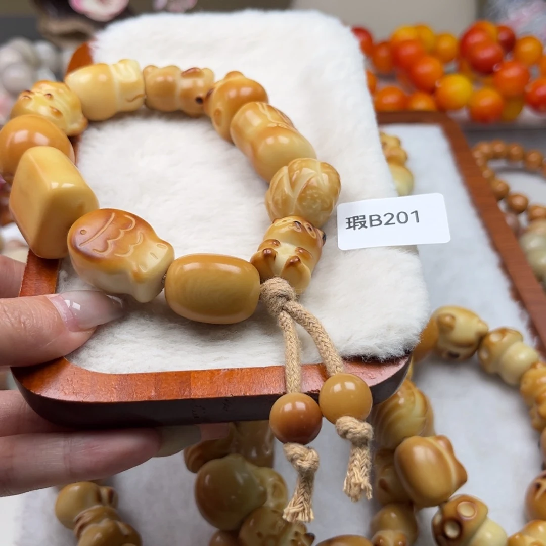 菩提根/象牙果手串花***系瑕wb201牙果手持18-20m
