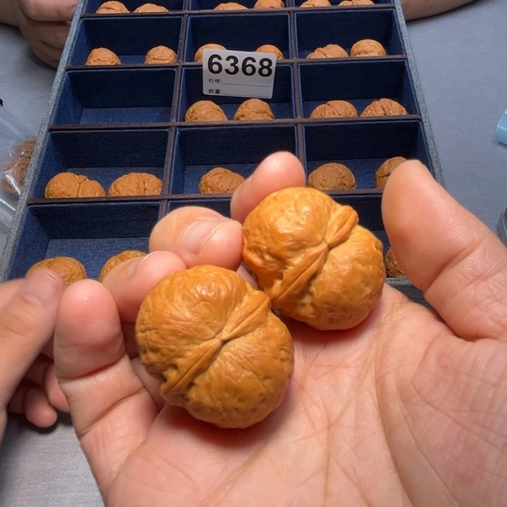 文玩核桃把件金丹元宝6368