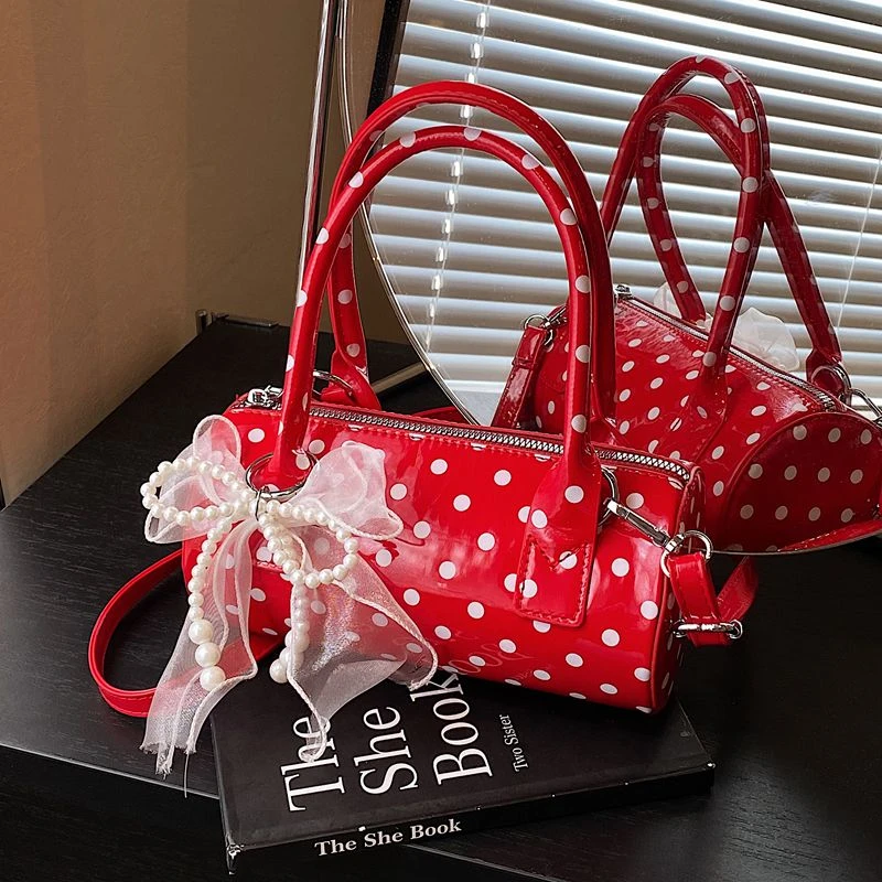 红色手提超火波点圆筒包包女式2025新款轻奢小众高级感斜挎婚包女