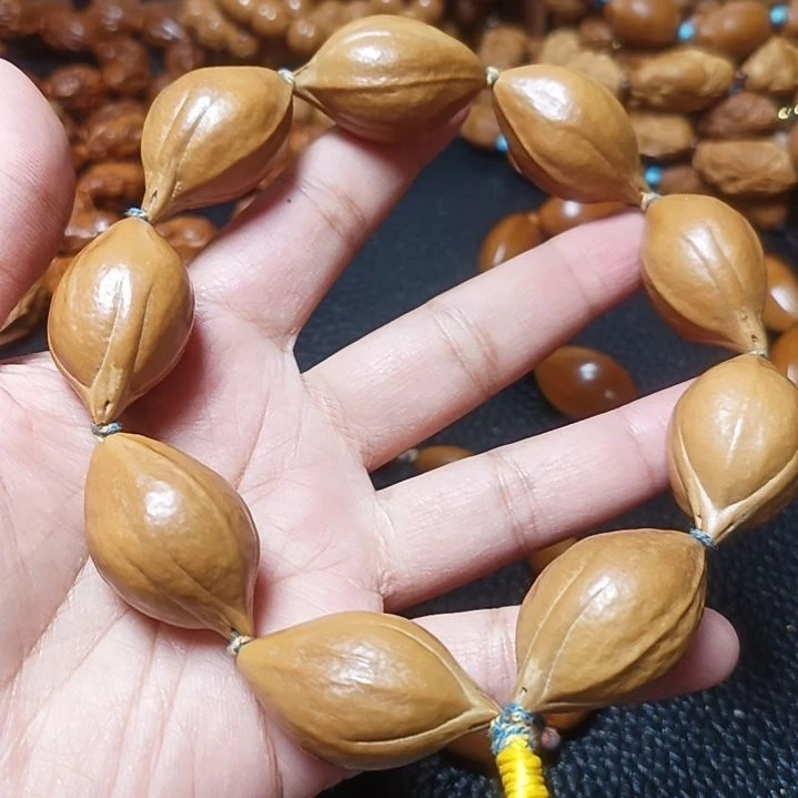 橄榄核吊坠橄榄核手串手持