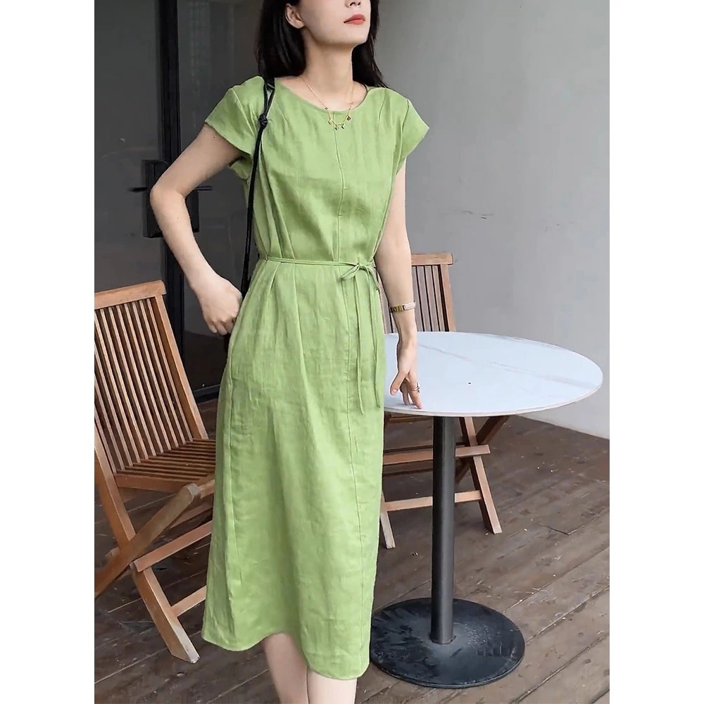 绿色连衣裙女小清新气质设计感2025夏新款宽松显瘦时尚优雅中长裙