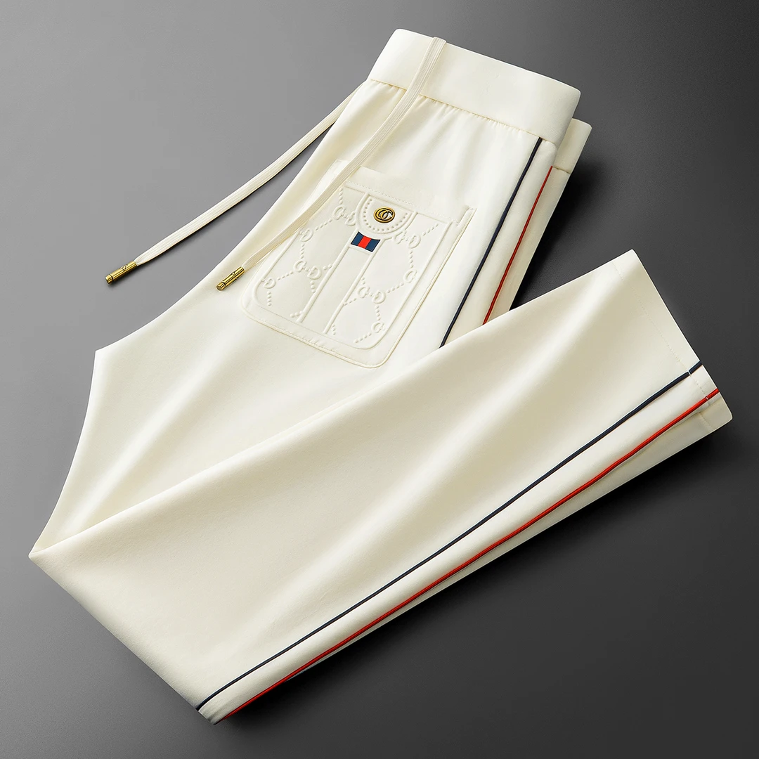 吉伦略索轻奢秋季时尚男士休闲裤撞色拼接提花显瘦运动直筒卫裤潮